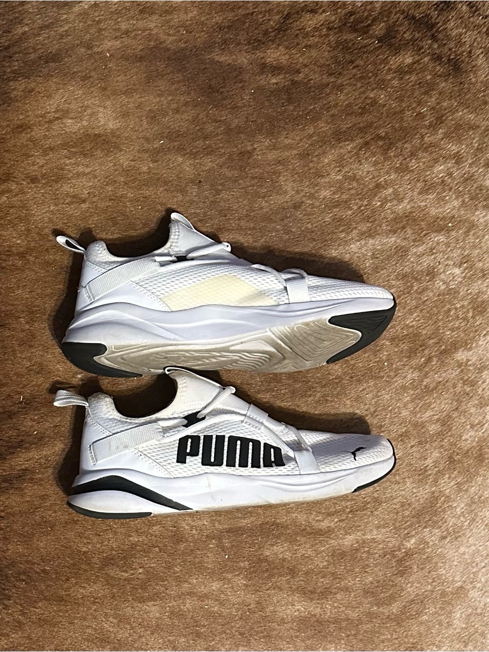 Puma White and Black Soft Ride Rigt Athletic Sneakers with Bold Logo